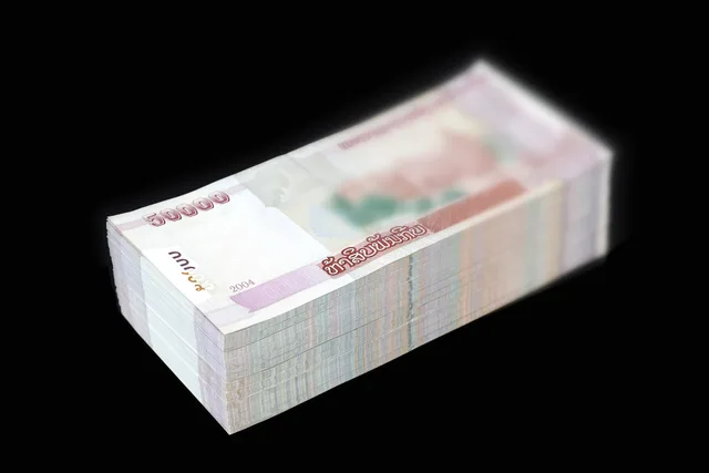 Stack of 360 new banknotes of 50'000 kips , on a black background. 18 millions LAK ( Laotian kip , currency from Laos ) in total. Actor net worth list: a dated, sourced directory as of 2027