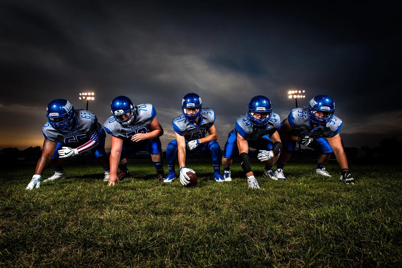 athletes, american football, players, football team, football players, football field, team, ball, field, football, game, grass, helmets, men, people, rugby, sport, stadium, nature, uniforms. NIL Money by State: Texas, California and Florida Rules